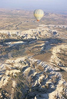 Hot air ballooning over rock formations