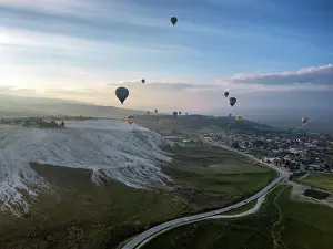 Wonders Prints: Hot air balloons float over Pamukkale at sunrise in Turkey