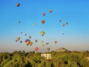 Excitement Prints: Hot air balloons flying over the Pyramid of the Sun at sunrise
