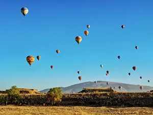 Experiences Prints: Hot air balloons flying over the Teotihuacan Archaeological Site at sunrise