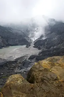 Monsoon Prints: Hot volcanic steam rising into monsoon clouds from Kawah Ratu (Queens Crater) of Mount Tangkuban