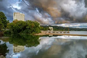 Hotels Prints: Hotels reflect in the water along the ocean promenade in Sukhumi