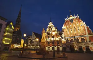 Ratslaukums Prints: House of Blackheads in Town Hall Square (Ratslaukums) with St. Peters in background