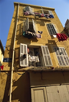 Marseille Prints: House with shutters and washing lines on the Rue du Panier, in the old town in Marseille