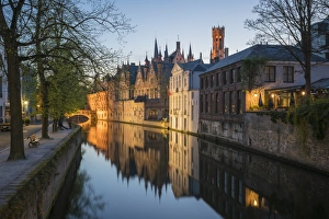 Spires Prints: Houses and bridge reflected in the Groenerei canal at dusk, Bruges, West Flanders province