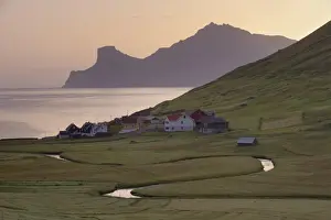 Faroes Prints: Houses at Elduvik at sunrise, with view across Funningsfjordur of Kalsoy cliffs of Nestindar