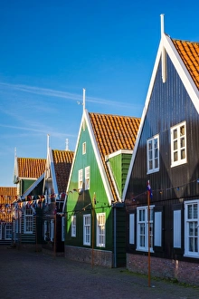 Bunting Prints: Houses in the village of Kerkbuurt, Marken, North Holland, Netherlands, Europe
