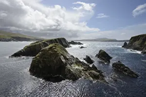 Shetland Prints: Huge clouds clear the way for bright sunshine to light the cliffs and islands of St