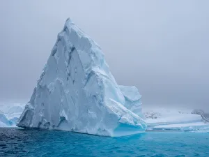 Polar Climate Prints: A huge iceberg grounded on a reef near the Iceberg Graveyard