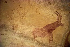 Rock Art Prints: Huge painting of god figure and sable antelope on rock wall, Tassili Plateau