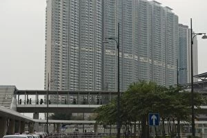 Huge res idential apartment blocks in the new s uburban town of Tung Chung