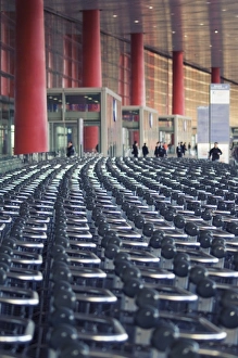 Hundreds of trolleys at Beijing Capital Airport, part of the new Terminal 3 building opened February 2008, second largest building in the world, Beijing