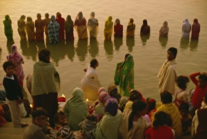 Surya Prints: Hundreds of women gather in rows along river front
