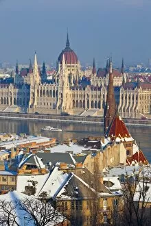 Images Dated 21st December 2009: Hungarian Parliament illuminated by warm light on a winter afternoon, Budapest, Hungary, Europe