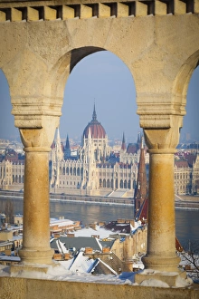 Images Dated 21st December 2009: Hungarian Parliament illuminated by warm light on a winters afternoon, Budapest, Hungary, Europe