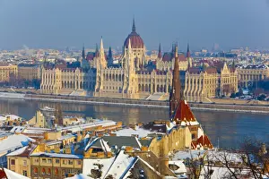 Parliament Building Prints: Hungarian Parliament illuminated by warm light on a winter afternoon