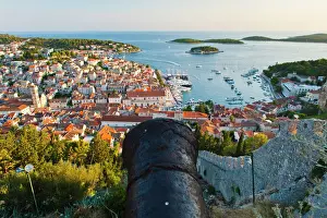 Protection Prints: Hvar Fortress cannon and Hvar Town at sunset taken from the Spanish Fort (Fortica)