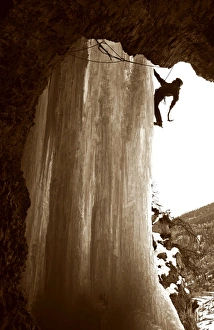 Images Dated 23rd February 2007: An ice climber scales a giant icicle in the valley of Crevoux, near Gap and Briancon