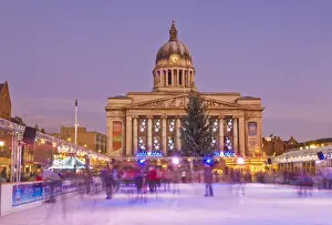 Front Prints: Ice skaters on the temporary Christmas outdoor ice skating rink in the Old Market Square in front of the Council House
