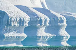 Glacial Prints: Icebergs display shades of blue near the Antarctic Peninsula during austral summer months