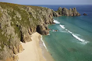 Iconic view from Treen cliffs, across the sands of Pedn Vaunder to the Logan Rock