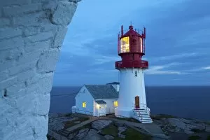 The idyllic Lindesnes Fyr Lighthouse illuminated at dusk, Lindesnes, Vest-Agder, Norway, Scandinavia, Europe