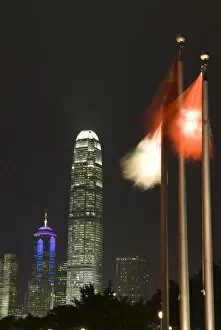Images Dated 6th November 2007: Two IFC Building and Hong Kong flags at night, Hong Kong, China, Asia