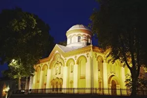 Illuminated church on Pilies Gatve, Vilnius, Lithuania, Baltic States, Europe