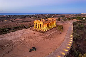 Ancient Greece Prints: Illuminated Concordia Greek Temple seen from above at dawn