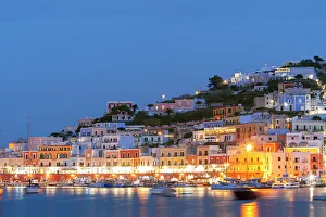 Fishing Village Prints: The illuminated fishing village of Ponza at dusk