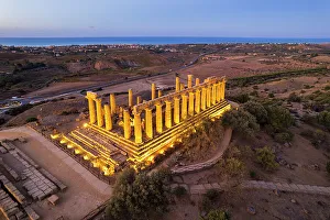 Ancient Greece Prints: The illuminated Greek Temple of Hera seen from a drone