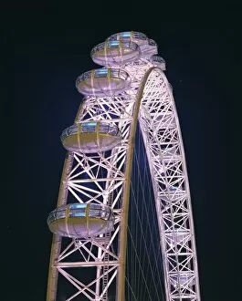 Millennium Wheel Collection: Illuminated by moving coloured lights, London Eye, architects Marks Barfield