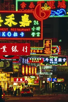 Tsim Sha Tsui Prints: Illuminated neon street signs, Nathan Road in Tsimshatsui, Hong Kong