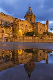 Palermo Gallery: The illuminated Palermo Cathedral (UNESCO World Heritage Site) reflected in a puddle