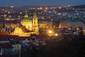 What's New: Illuminated St. Nicholas Church at night, Mala Stranar, UNESCO World Heritage Site, Prague, Bohemia