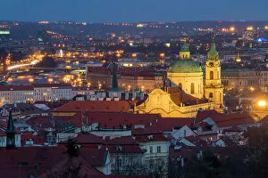 What's New: Illuminated St. Nicholas Church at night, Mala Strana, UNESCO World Heritage Site, Prague, Bohemia