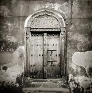 Monochrome Collection: Image taken with a Holga medium format 120 film toy camera of old Omani studded timber door