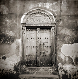 Monochrome Gallery: Image taken with a Holga medium format 120 film toy camera of old Omani studded timber door