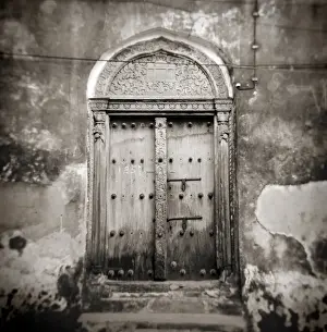 Image taken with a Holga medium format 120 film toy camera of old Omani studded timber door