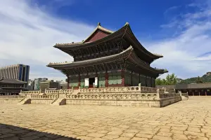 Typically Korean Prints: Imperial Throne Hall (Geunjeongjeon) with modern city skyline, Gyeongbokgung Palace