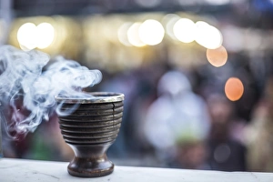 Incense burning at a Hindu temple in New Delhi, India, Asia