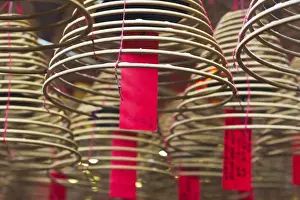 Coil Prints: Incense coils and prayers written on red tags in the Man Mo Temple, Hong Kong, China, Asia