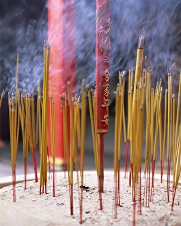 Stick Prints: Incense sticks burning