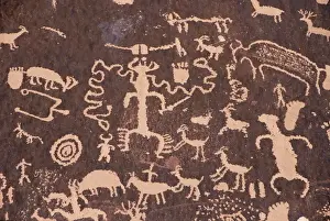 Rock Art Prints: Indian petroglyphs drawn on red standstone by scratching