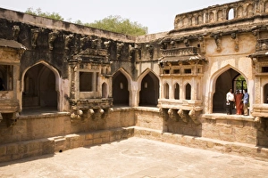 Indian tourists visit the Queens Bath within the royal enclosure at Hampi Indian tourists visit the Queens Bath within the royal enclosure at Hampi