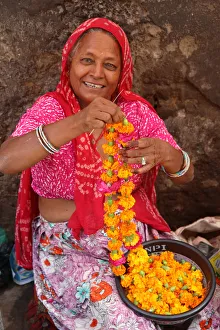 Portrait Prints: Indian woman making garlands in Ajmer, Rajasthan, India, Asia