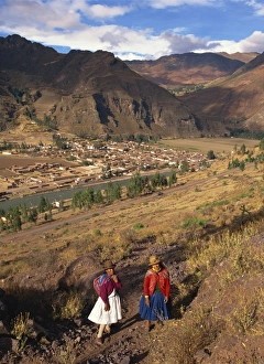 Pisac Prints: Two Indian women outside the town of Pisac in the Cuzco area of Peru, South America