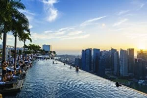 Office Building Collection: Infinity pool on the roof of the Marina Bay Sands Hotel with spectacular views over