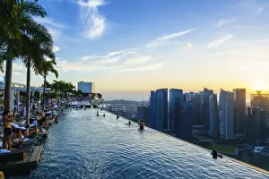South East Asian Prints: Infinity pool on the roof of the Marina Bay Sands Hotel with spectacular views over