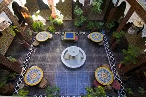 The inner yard of a little boutique hotel, formerly a manor hous e, in Marrakech